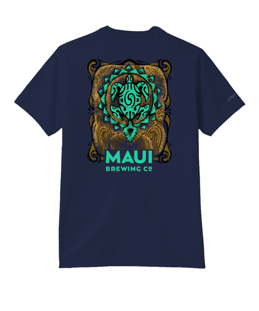 A navy blue short-sleeve t-shirt with a large graphic on the front. The graphic features a stylized teal and gold tribal skull design with the text 'MAUI BREWING CO' printed below in teal and gold. View 1