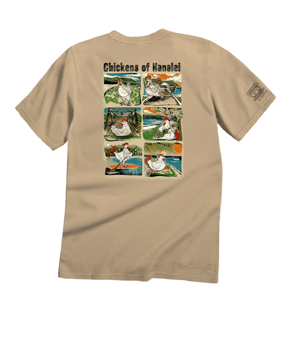 A beige short-sleeve t-shirt shown from the back, featuring a large graphic print of a six-panel comic strip titled 'Chickens of Kanalei' and a small graphic on the left sleeve. View 1