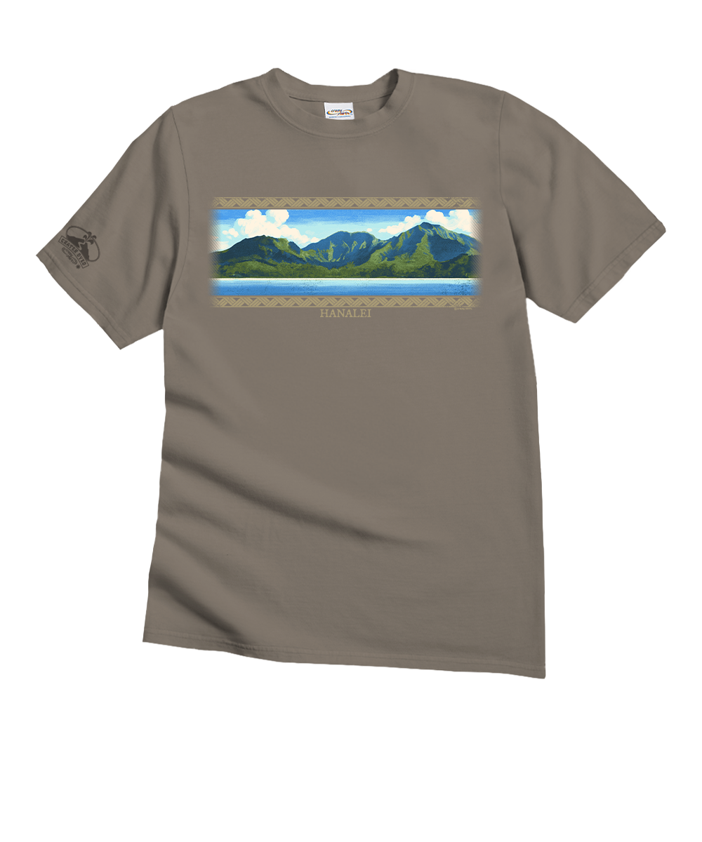 A taupe brown short-sleeve crewneck t-shirt featuring a landscape graphic of Mount Huihu in New Zealand on the chest, with a decorative border and the text 'MOUNT HUIHU' below the print. A small black graphic is printed on the left sleeve. View 1