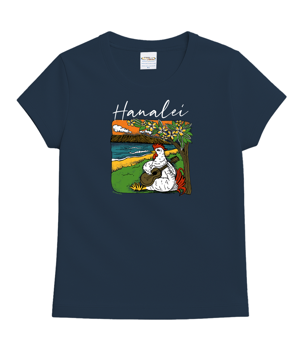A navy blue short-sleeve t-shirt with a graphic print on the front. The graphic features the word 'Hanalei' in white script above an illustration of a white-haired figure in a landscape with green grass, a tree, and a sunset. View 1