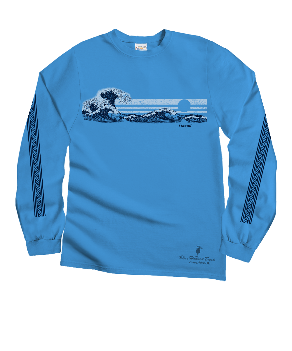 A blue long-sleeve crewneck shirt featuring a graphic print of a Japanese wave (reminiscent of 'The Great Wave off Kanagawa') on the chest, with dark blue tribal-style patterns running down both sleeves and a small logo near the lower right hem. View 1