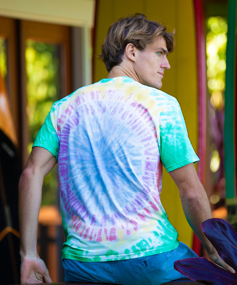Person wearing a tie-dye shirt with a colorful background View 3