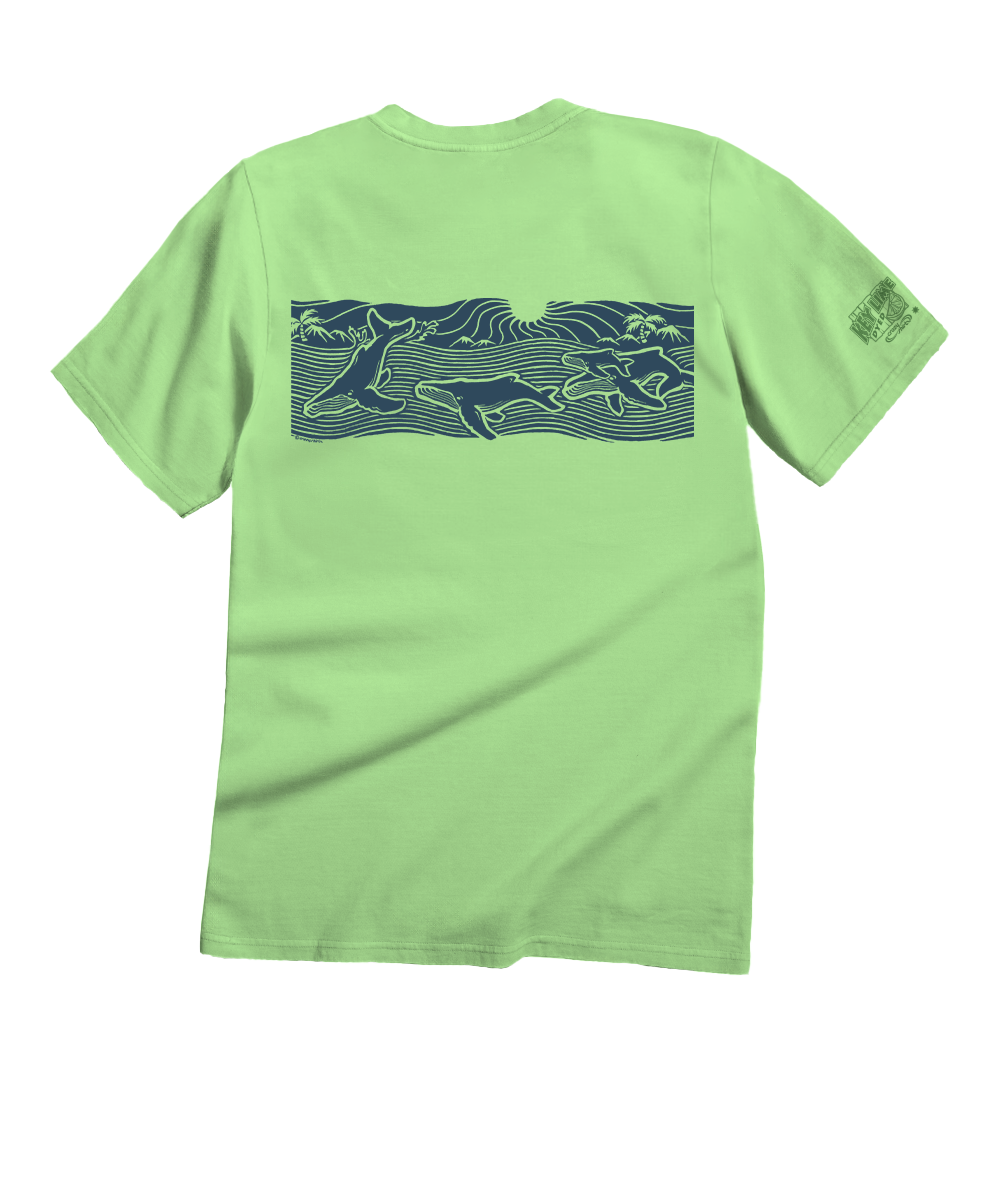 A light green short-sleeve t-shirt shown from the back, featuring a dark blue graphic print of surfers riding waves across the upper back and a small matching graphic on the left sleeve. View 4