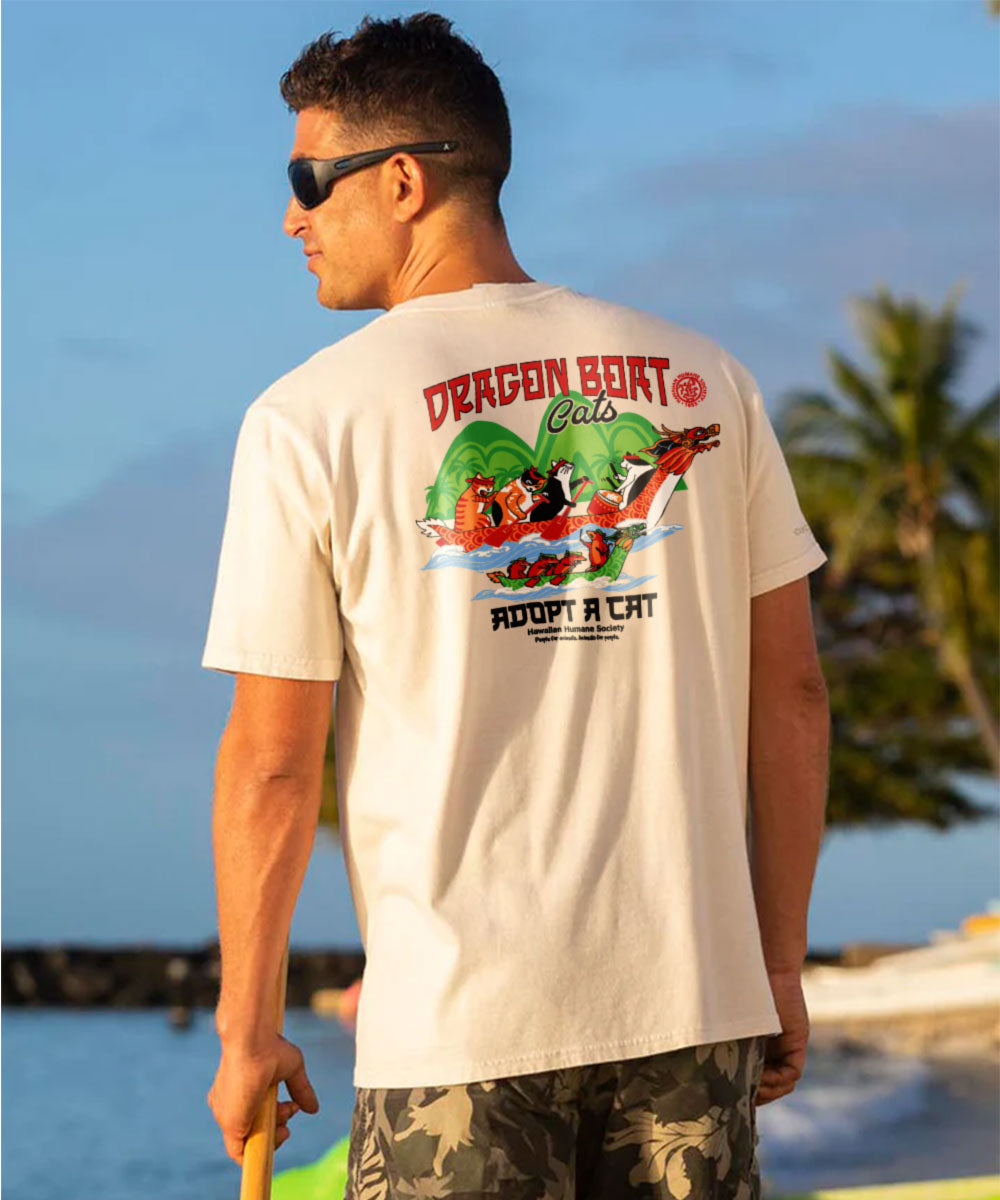 Man wearing a t-shirt with a dragon boat design and text outdoors. View 3