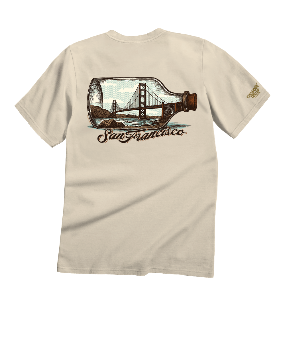 Beige t-shirt with a graphic of the Golden Gate Bridge in a bottle and 'San Francisco' text on a white background View 1
