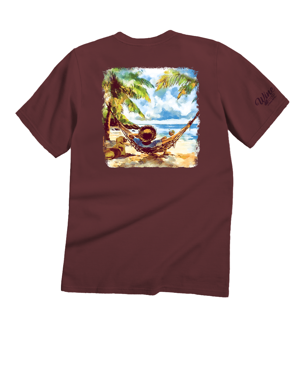A maroon short-sleeve t-shirt with a square graphic print on the back depicting a tropical beach scene with a hammock, palm trees, and ocean. The brand name 'Cape May' is printed in black script on the left sleeve. View 1