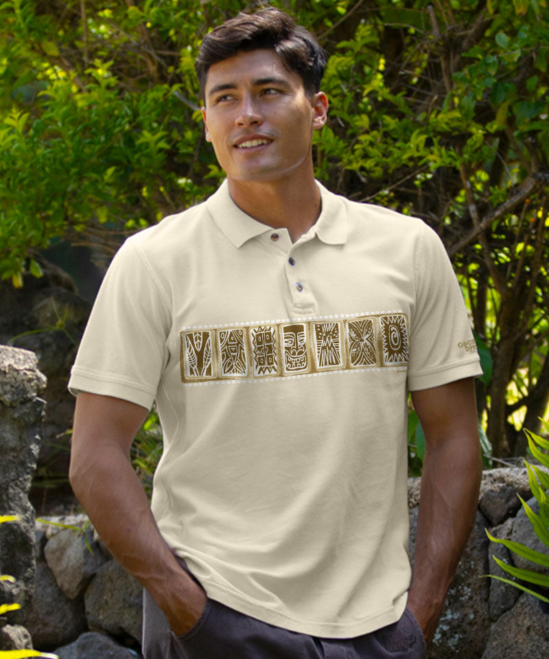 Man wearing a white polo shirt with a decorative pattern, standing outdoors with greenery in the background. View 2