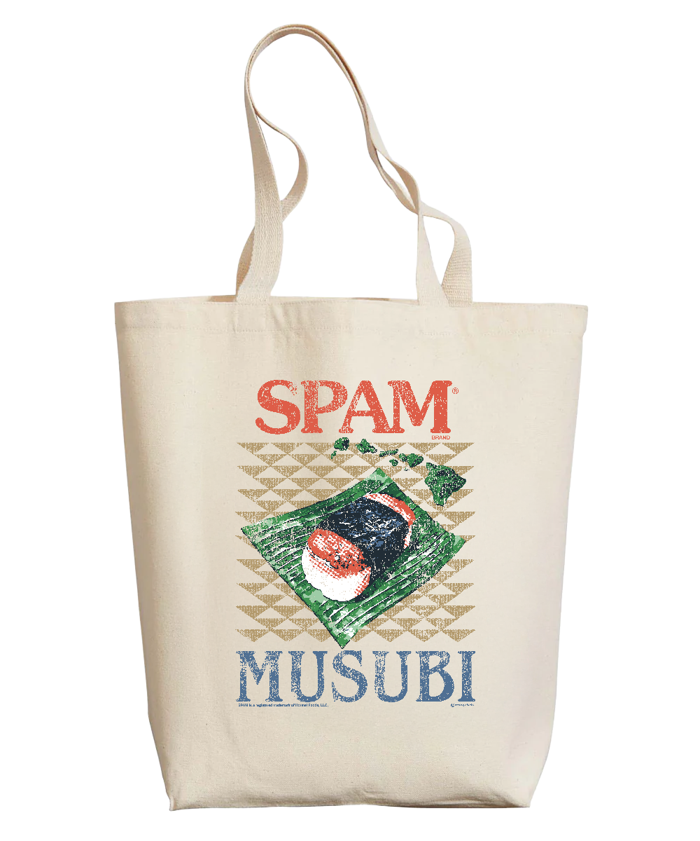 A cream-colored canvas tote bag featuring a vintage-style graphic print of Spam Musubi, with the words 'SPAM' in red and 'MUSUBI' in blue, and a central illustration of a spam and avocado wrap. View 1