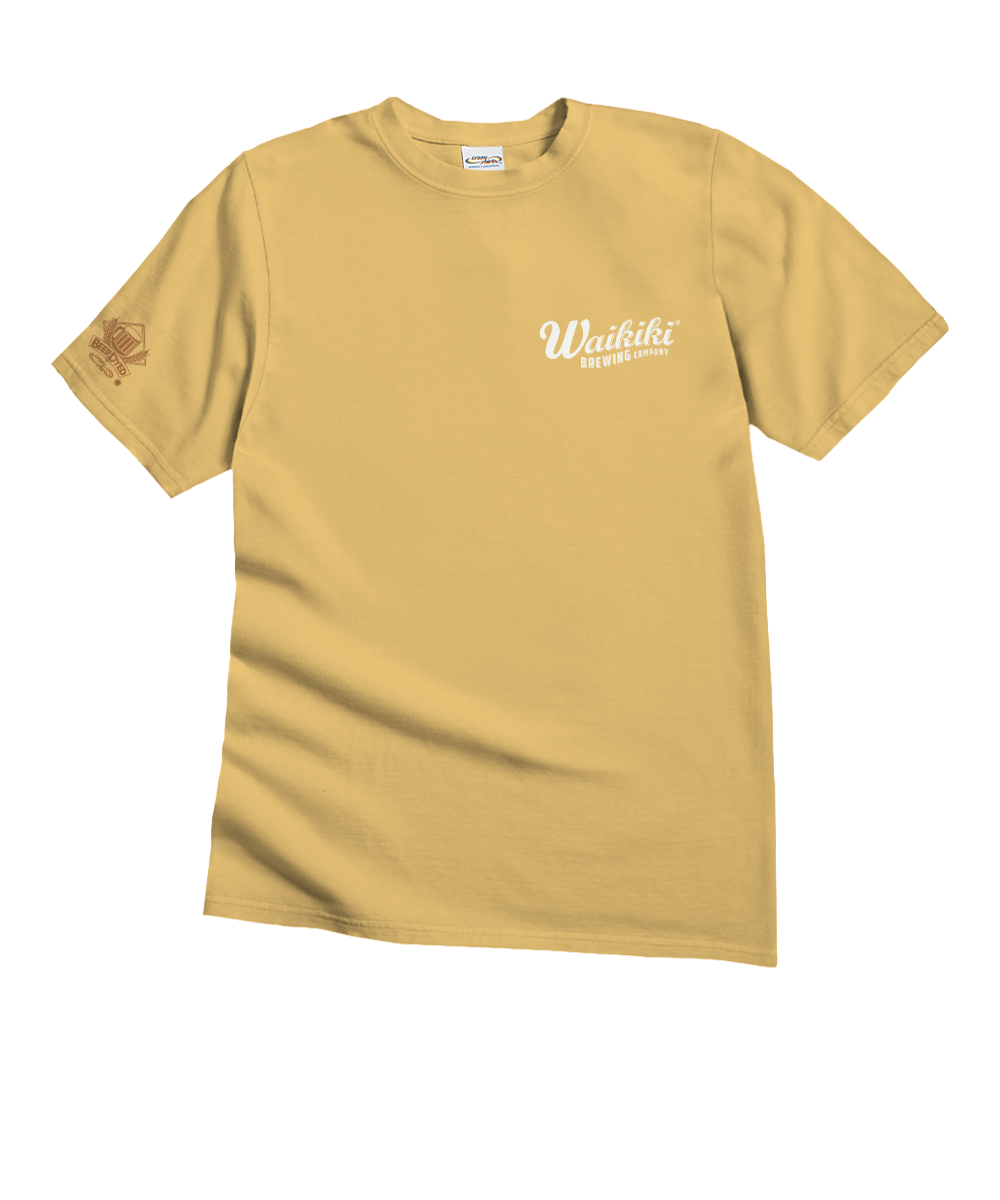 A mustard yellow short-sleeve t-shirt with a white 'Whitiki' logo printed on the left chest and a small brown graphic on the right sleeve, displayed against a plain white background. View 4