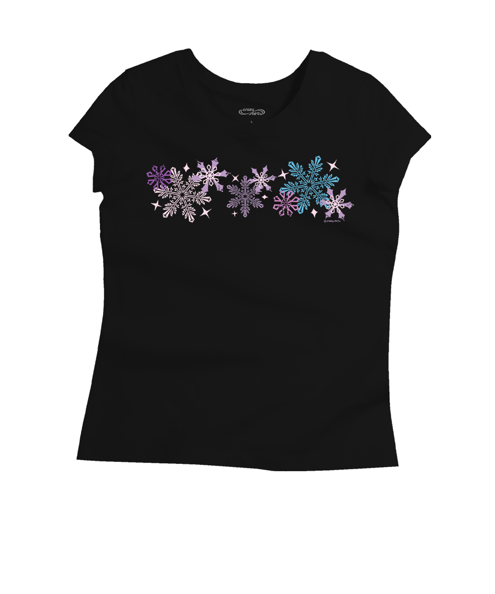 A black short-sleeve girls' t-shirt featuring a horizontal row of glittery snowflakes in purple, silver, and blue across the chest, displayed on a solid white background. View 1
