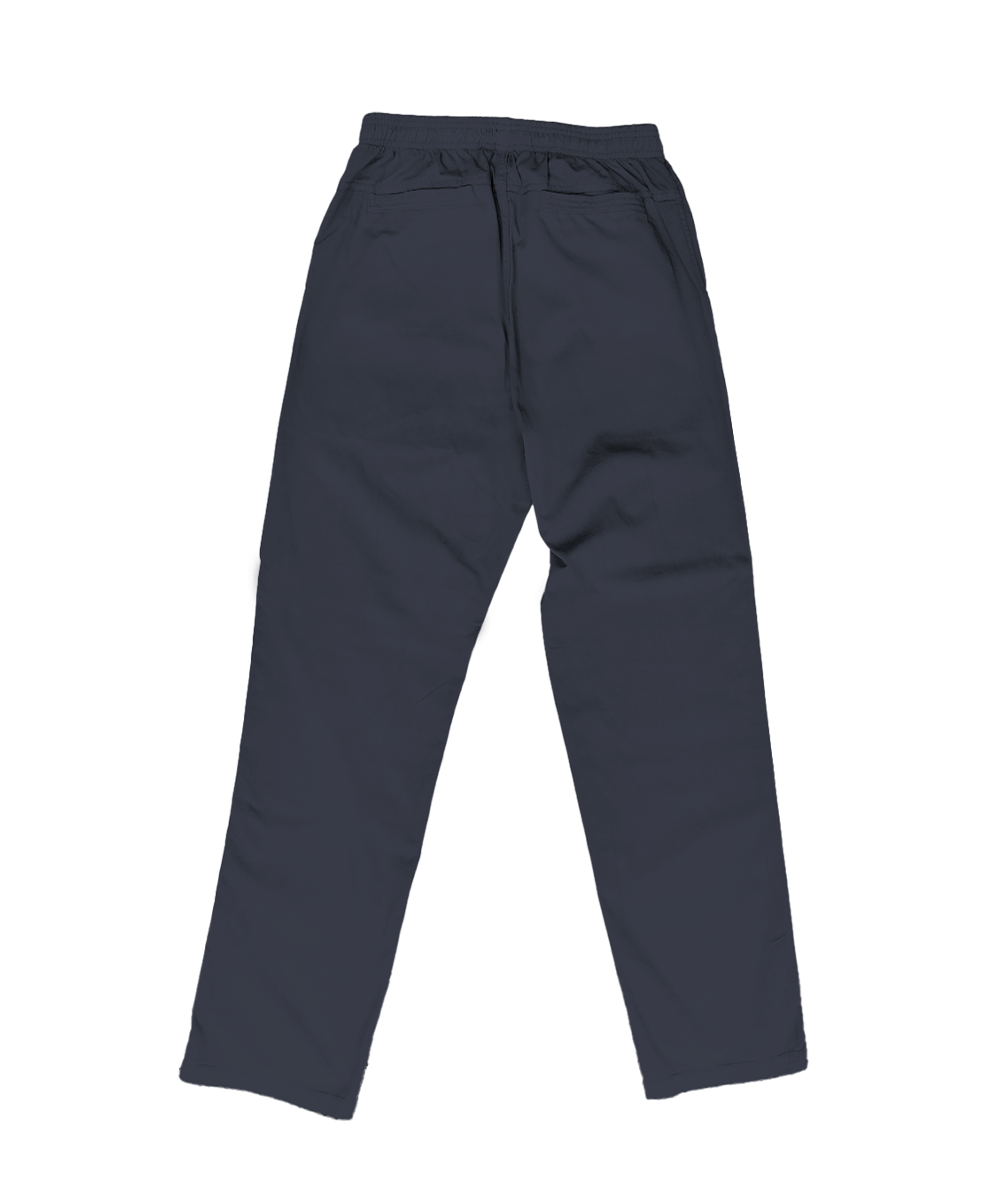 A pair of dark navy blue pants shown from the back, featuring an elastic waistband and zippered back pockets, laid flat against a white background. View 4
