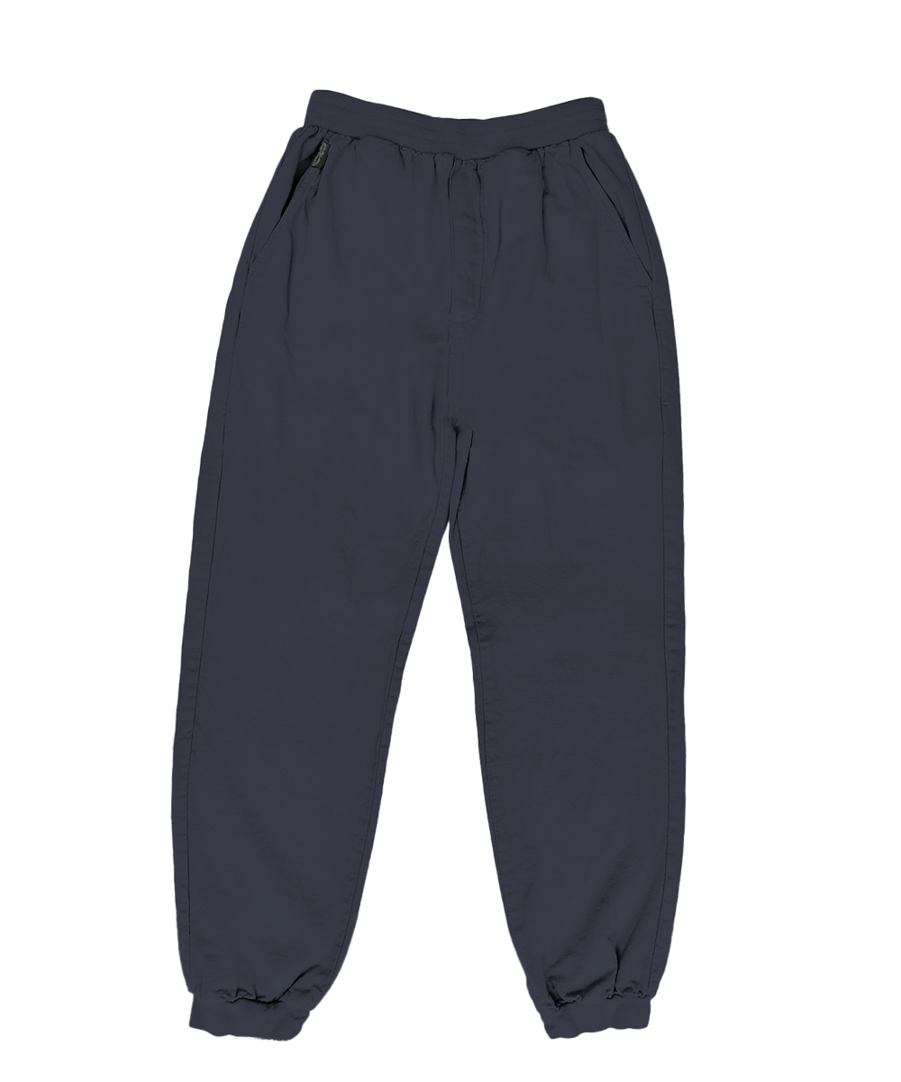 Dark slate blue jogger pants with an elastic waistband and cuffed ankles, shown flat on a white background. View 1