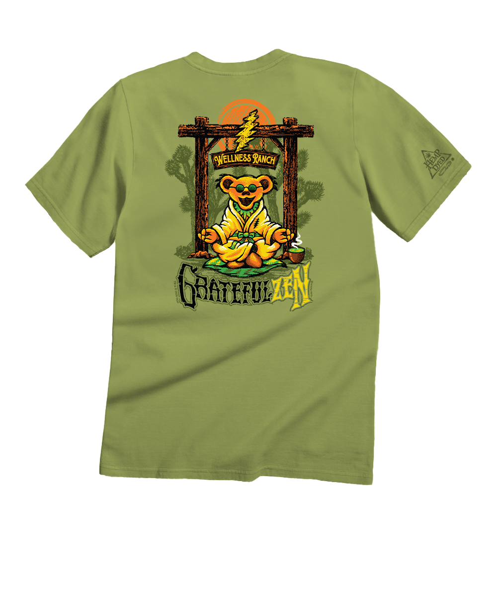 An olive green short-sleeve t-shirt shown from the back, featuring a large graphic print of a Grateful Dead teddy bear in a robe under a 'Wallace Ranch' sign with a lightning bolt and 'Grateful Dead' text. View 1
