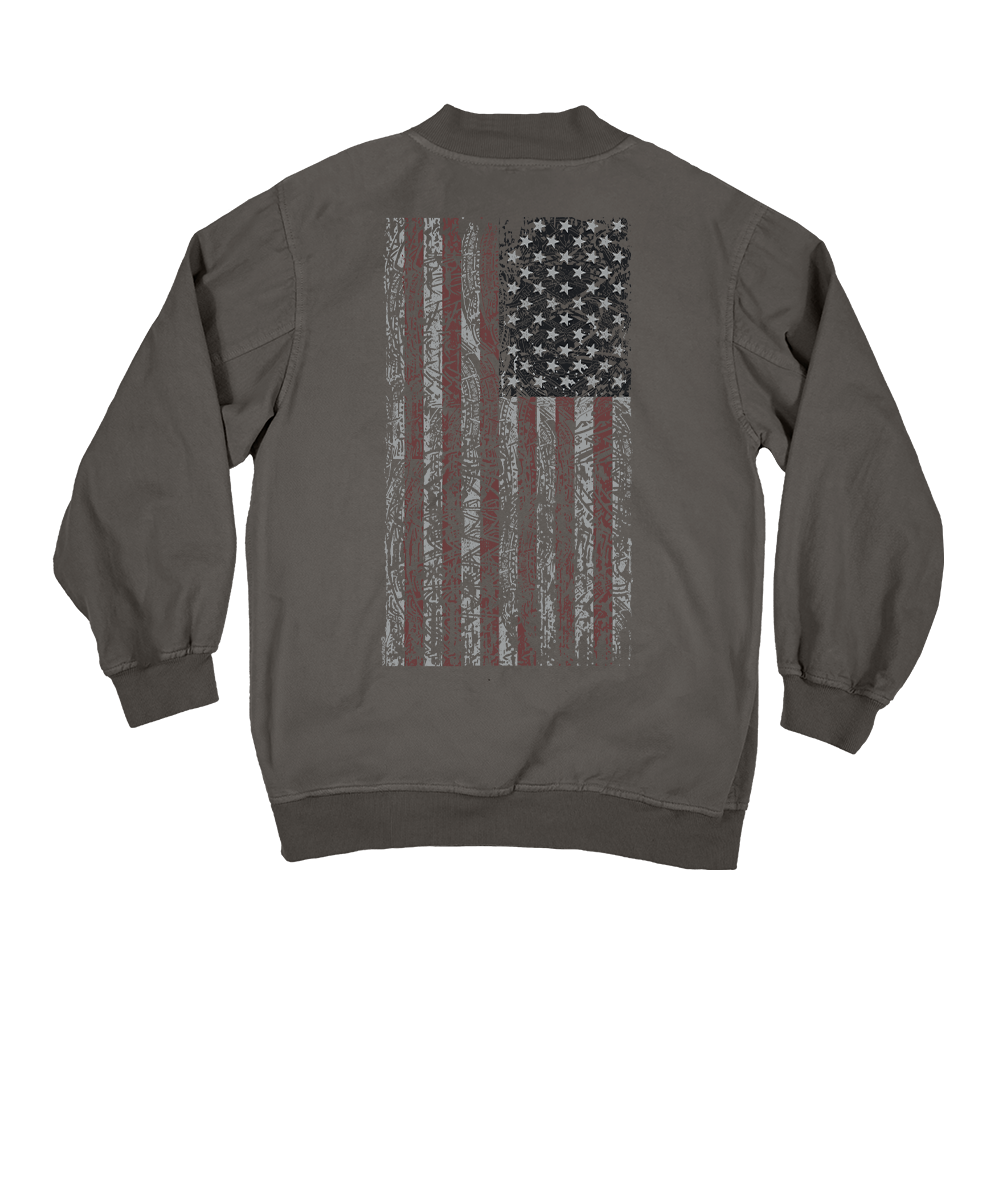 A dark gray crewneck sweatshirt shown from the back, featuring a distressed vertical American flag graphic with a single red stripe on a white studio background. View 1