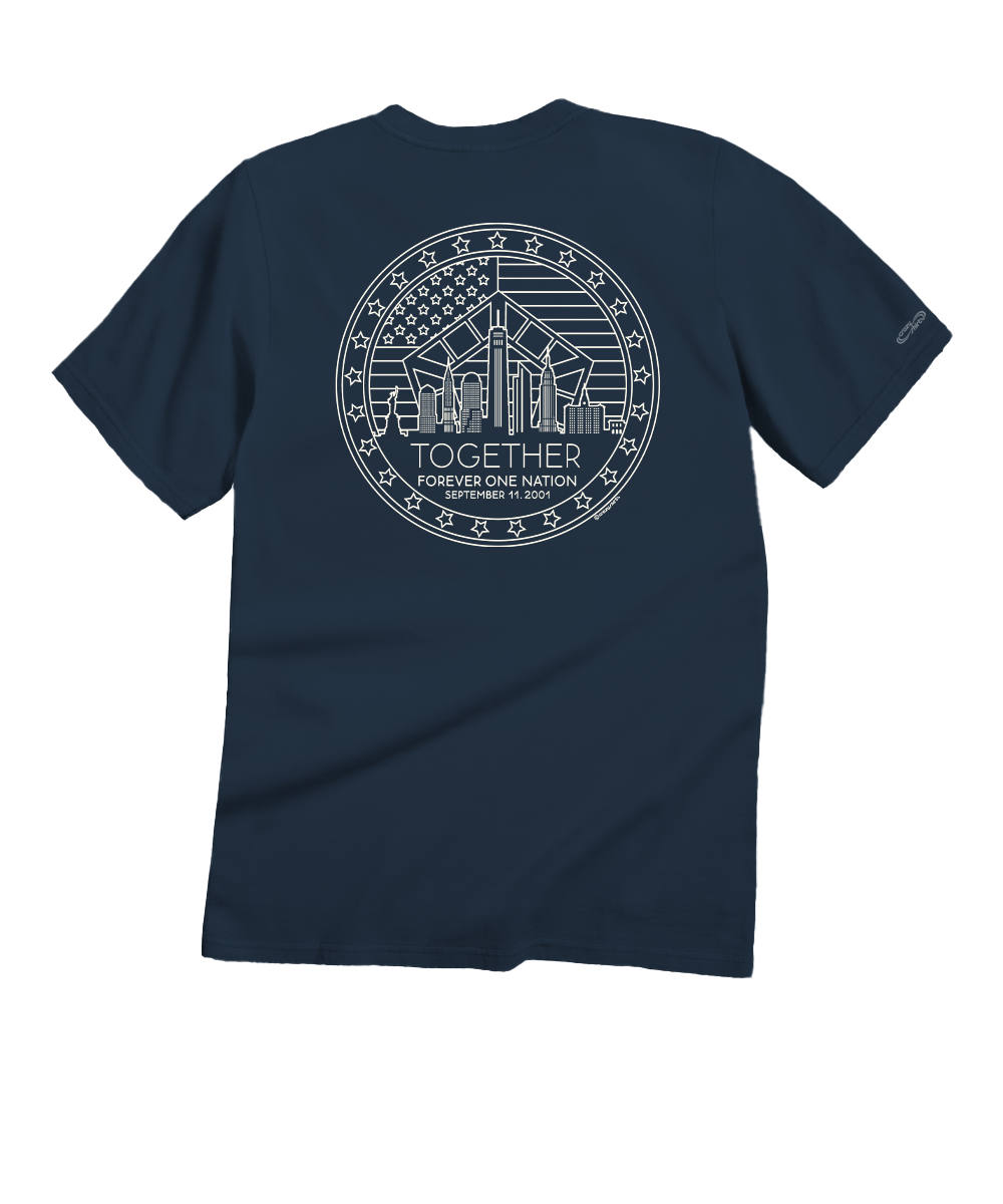 A navy blue short-sleeve t-shirt shown from the back, featuring a colorful graphic print of Palm Springs with a sun, wind turbines, and the text 'Palm Springs' in a retro font. View 1