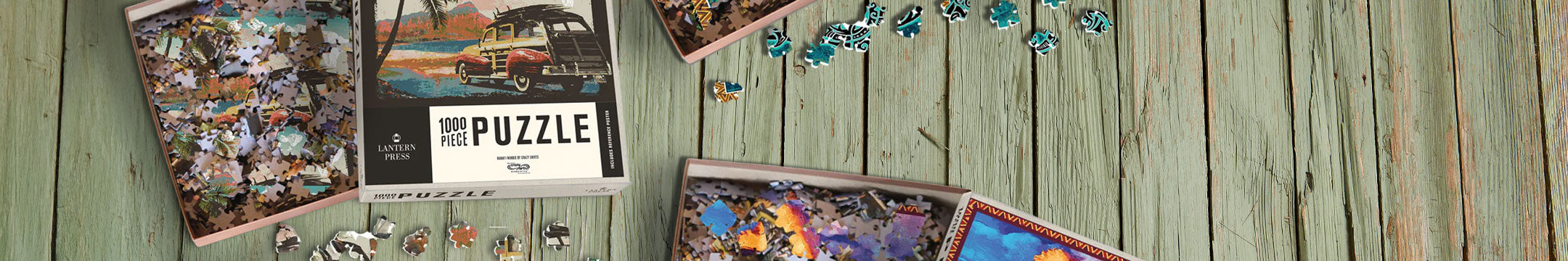 Puzzles on a wooden surface with packaging
