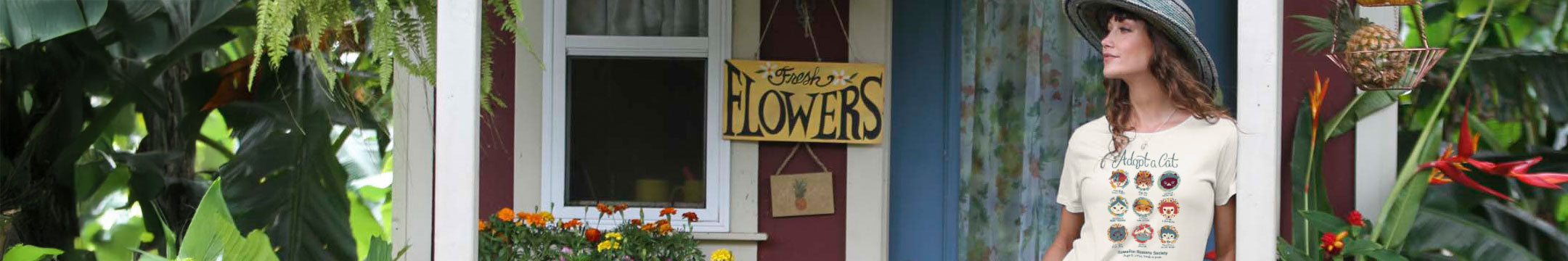 Woman standing in front of a flower shop with a 'Flowers' sign. 