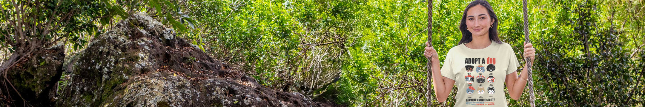 Woman holding a stick in a forest setting
