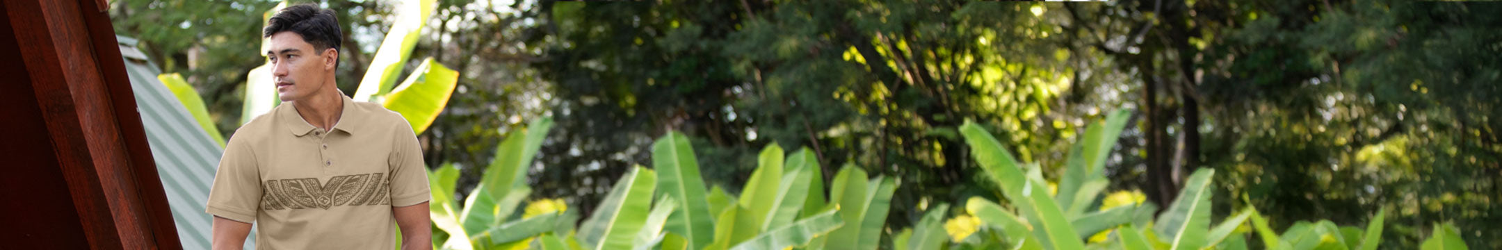 Man standing outdoors with greenery in the background, wearing a Kona Coffee Dyed Polo