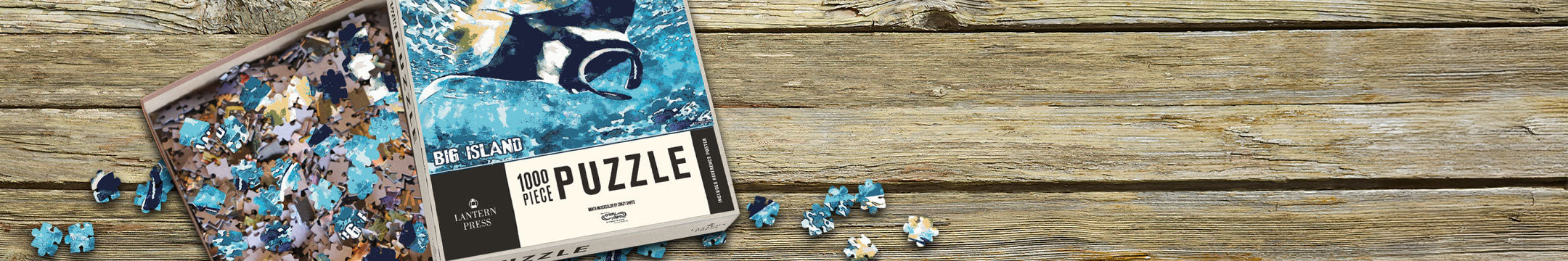 Puzzle box with pieces on a wooden surface