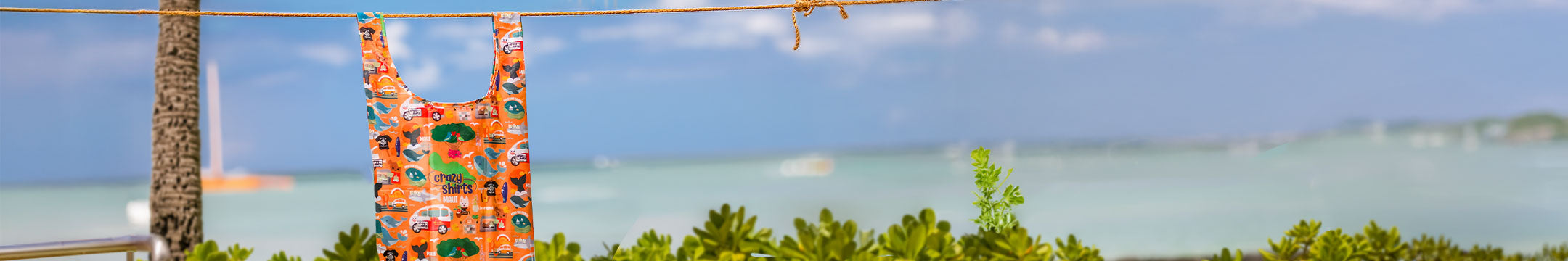 Orange eco tote on a clothes line 