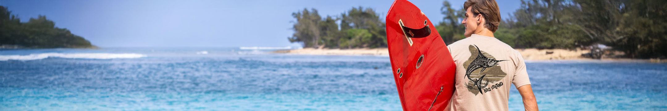 Man wearing a shirt with a fish design on it