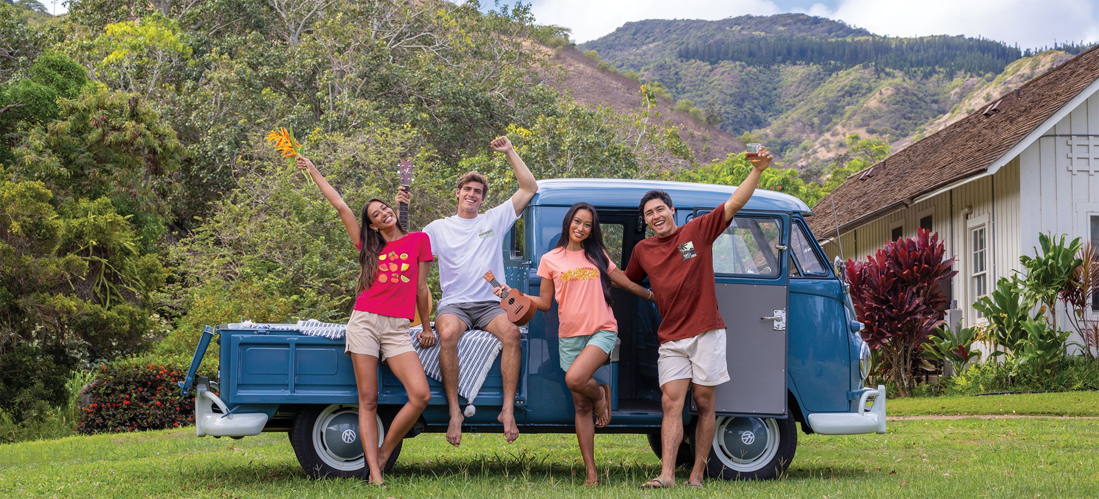 Group standing in front of a VW van all wearing new spring Crazy Shirts