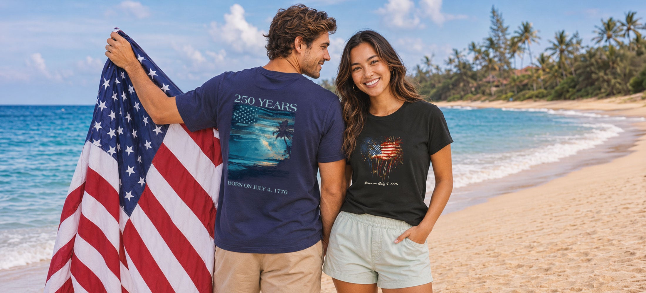 Two people on a beach, one holding an American flag, wearing t-shirts with graphic designs.