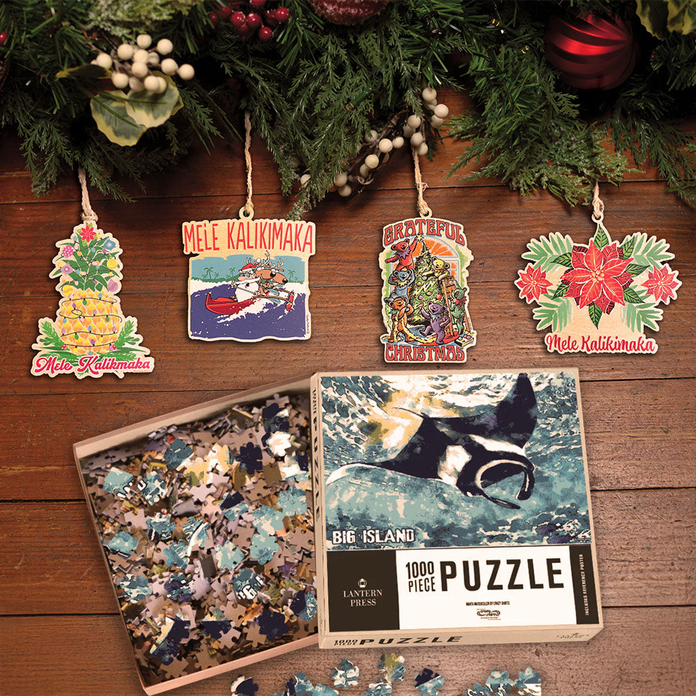 Collection of Christmas-themed ornaments and a puzzle on a wooden surface with holiday decorations.